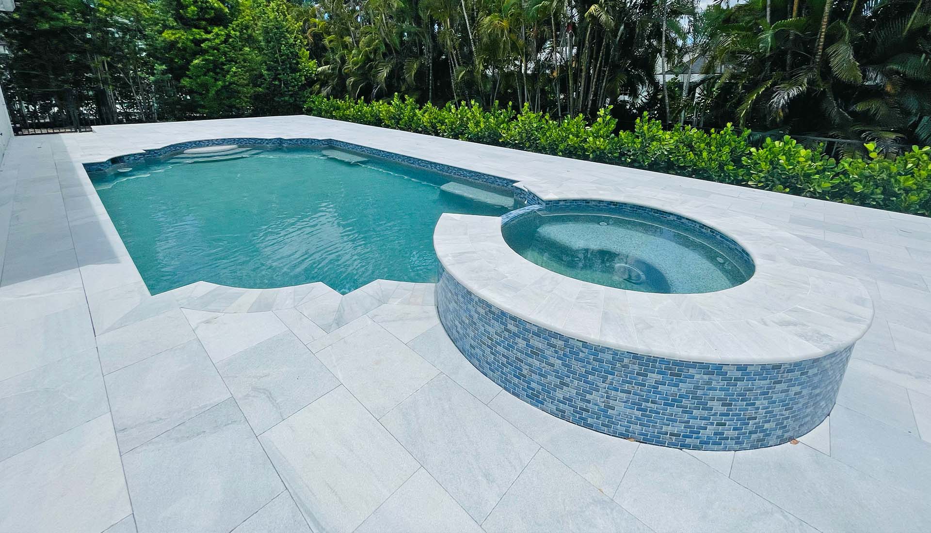 Gorgeous pool, spa, and deck renovation by Pool and Deck Concepts, Naples, FL