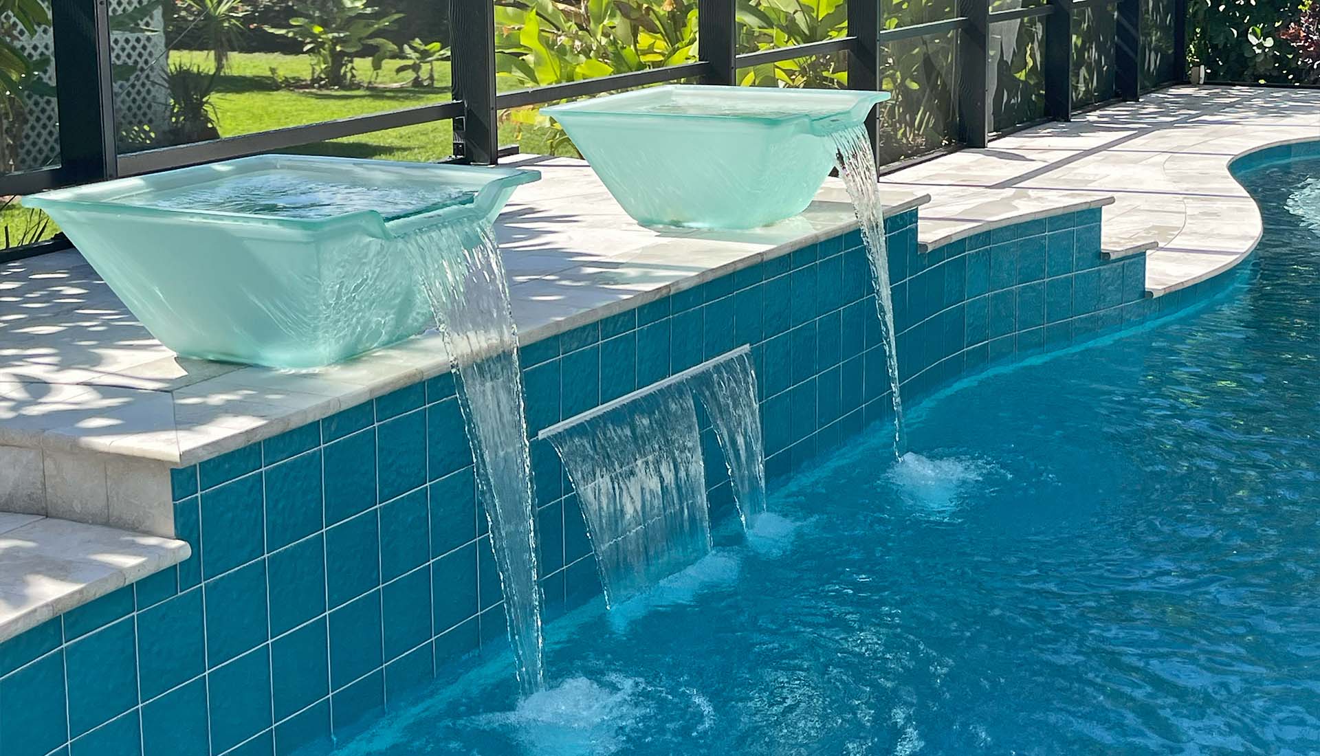 Glass water bowl pool feature by Pool and Deck Concepts